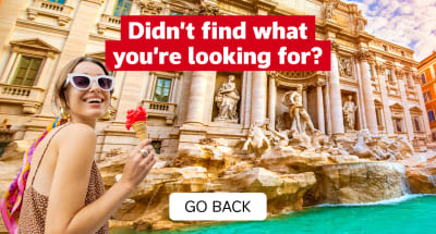 Didn't find what you're looking for? - go back. Woman with an ice cream at the Trevi Fountain