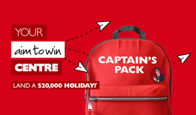 Your aim to win centre - land a $20,000 holiday*. Red Flight Centre Captain's Pack with cartoon paper aeroplanes