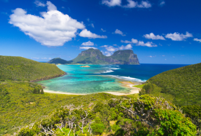 View south over lagoon to Mt Lidgbird and Mt Gower, with heart-shaped cloud overhead on Lord Howe Island