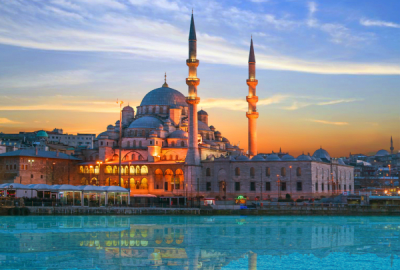 Yeni Mosque in Istanbul catches the last of the sun's rays at sunset