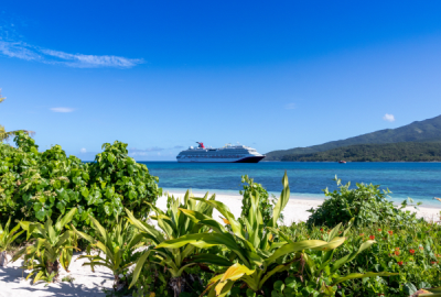 The Carnival Splendor ship in the water off Mystery Island