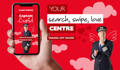 Your search, swipe, love centre - taking off soon! Hand holding a phone with a pilot posing suggestively in front of a red cupid background