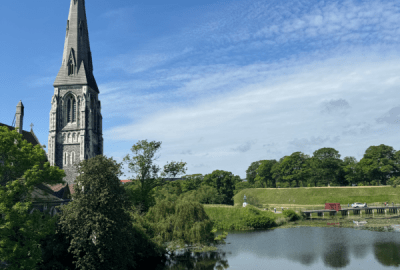 Church and pond in Kastellat Gardens in Copenhagen