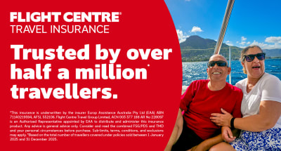 Flight Centre Travel Insurance trusted by over half a million travellers with a couple relaxing aboard a boat