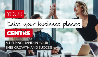 Your take your business places centre - A helping hand in your SMEs growth and success. Businesswomen high-fiving in a meeting room