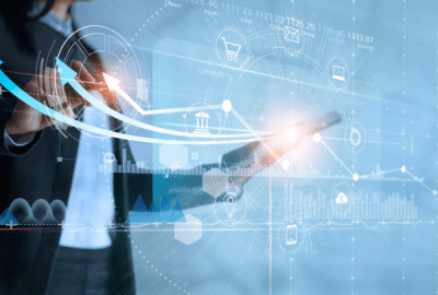 Business woman using tablet analyzing sales data and drawing growth graph with icon customer network connection on virtual interface