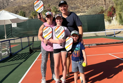 A family get set to play pickleball