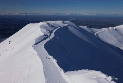 Skiers scaling the heights of Mt Hutt, Canterbury, New Zealand