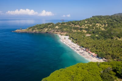 Aerial view of Virgin beach between Candidasa and Amlapura in the Karangasem regency in eastern Bali, Indonesia