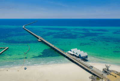 A drone's view of the Busselton jetty extending into the turquoise waters of Geographe Bay
