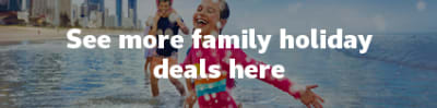See more family holiday deals here | family playing in the surf on the Gold Coast