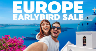 Europe Earlybird Sale - couple smiling taking a photo in Greece