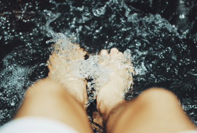 Feet in a bubbling spa bath