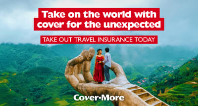 Take on the world with cover for the unexpected - take out travel insurance today | CoverMore | Couple standing on a hand in Vietnam