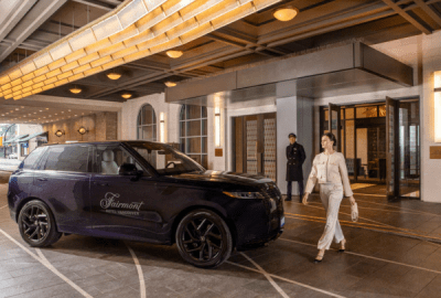 A woman approaches a flash-as car