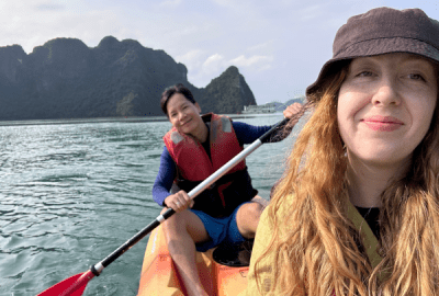 Emma and Thao kayaking in Ha Long Bay