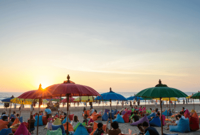 Sunset over beach diners on Seminyak Beach, Bali