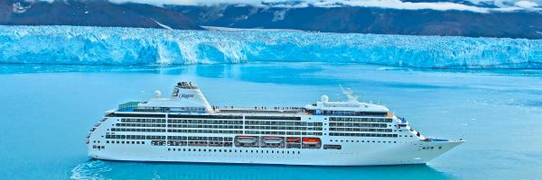 Cruise ship with icey glaciers in distance