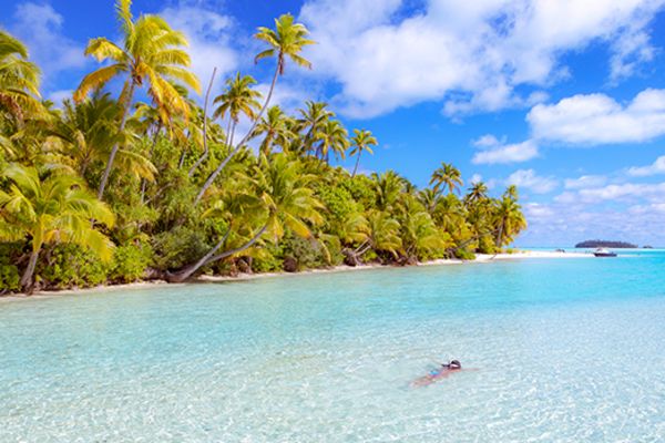 lady floating in water in cool islands