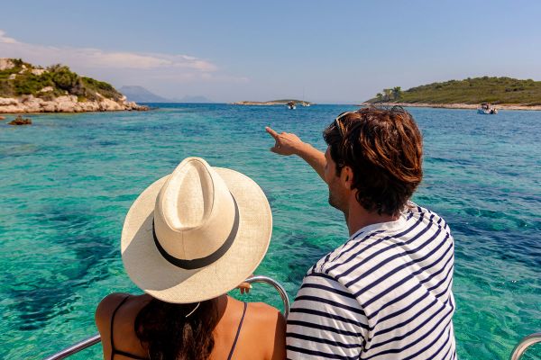 Couple enjoying the sunny day on the boat