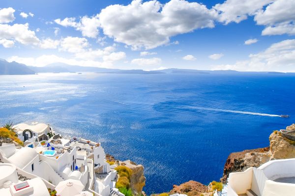 Coastal city in Greece with tightly packed white buildings