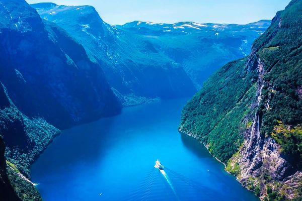 Norwegian fjords with bright blue lake in between