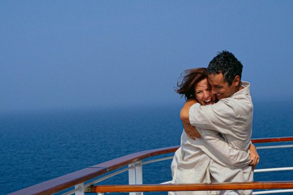 Couple hugging on top deck