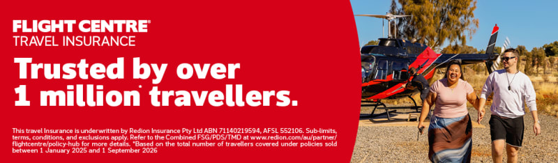 Couple walking away from a helicopter in the safari featuring Flight Centre Travel Insurance trusted by over 1 million travellers