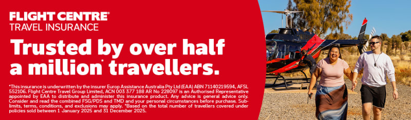 Travellers walking hand in hand beside a helicopter promoting Flight Centre Travel Insurance trusted by over half a million travellers