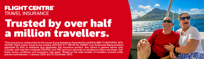 Flight Centre Travel Insurance trusted by over half a million travellers with a couple relaxing aboard a boat
