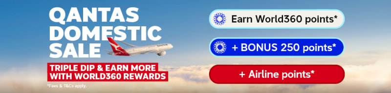 Qantas plane flying above clouds for a Qantas domestic sale with triple dip rewards on eligible flight bookings