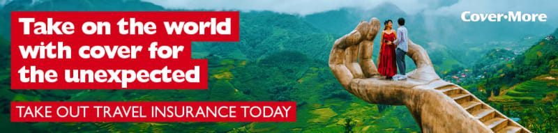 Take on the world with cover for the unexpected - take out travel insurance today | CoverMore | Couple standing on a hand in Vietnam