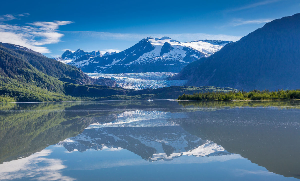 View of Mendenhall Glacier reflected in Mendenhall Lake Alaska